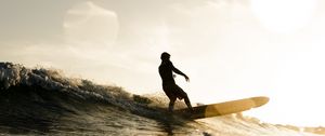 Preview wallpaper surfer, surfing, waves, sunset, glare, bokeh