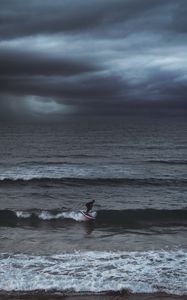 Preview wallpaper surfer, surfing, waves, sea, ocean, overcast