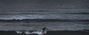 Preview wallpaper surfer, surfing, waves, sea, ocean, overcast