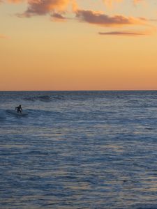 Preview wallpaper surfer, surfing, waves, ocean, sunset, dusk