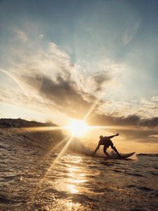 Preview wallpaper surfer, wave, sun, ocean, sunlight, glare