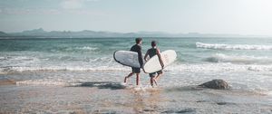 Preview wallpaper surfers, surfing, ocean, beach, waves