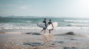 Preview wallpaper surfers, surfing, ocean, beach, waves