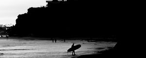 Preview wallpaper surfing, surfer, bw, coast, rocks