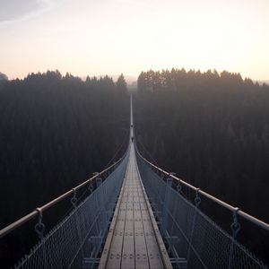 Preview wallpaper suspension bridge, bridge, fog, forest