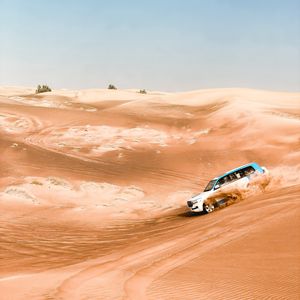 Preview wallpaper suv, jeep, desert, sand, dust, sky