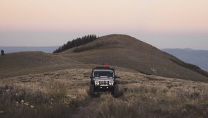 Preview wallpaper suv, mountain, car, grass, off-road