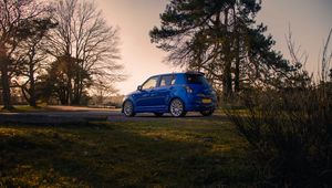 Preview wallpaper suzuki, car, blue, park, trees