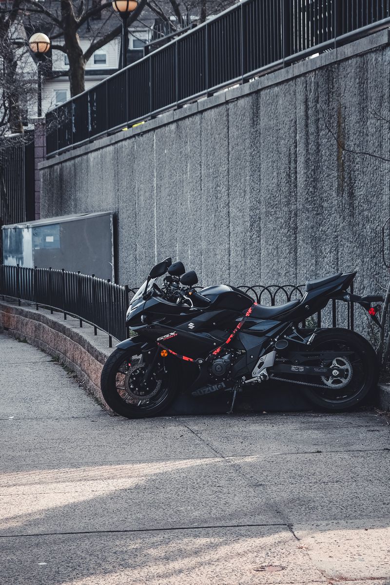 800x1200 Wallpaper suzuki, motorcycle, bike, black, parking