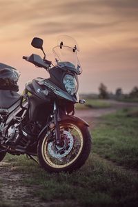 Preview wallpaper suzuki, motorcycle, bike, black, field, sunset, moto