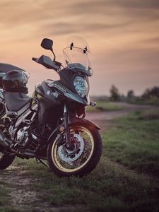 Preview wallpaper suzuki, motorcycle, bike, black, field, sunset, moto