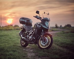 Preview wallpaper suzuki, motorcycle, bike, black, field, sunset, moto