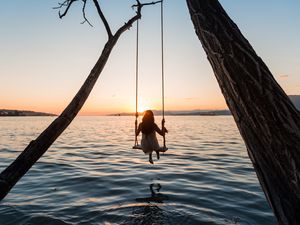 Preview wallpaper swing, girl, sunset, lake, river