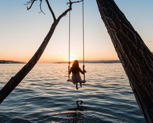 Preview wallpaper swing, girl, sunset, lake, river