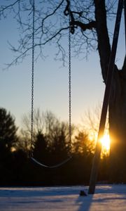 Preview wallpaper swing, winter, sunset, tree, blur