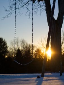 Preview wallpaper swing, winter, sunset, tree, blur