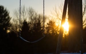 Preview wallpaper swing, winter, sunset, tree, blur