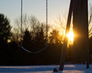 Preview wallpaper swing, winter, sunset, tree, blur