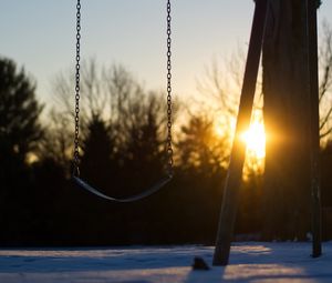 Preview wallpaper swing, winter, sunset, tree, blur