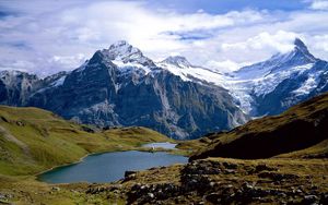 Preview wallpaper switzerland, mountains, lake, stones, grass