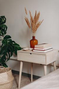 Preview wallpaper table, books, bouquet, vase, interior