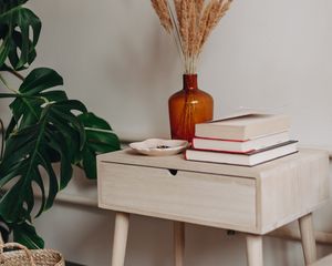 Preview wallpaper table, books, bouquet, vase, interior
