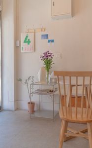 Preview wallpaper table, chair, vase, flowers, interior, decor, aesthetics