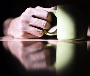 Preview wallpaper table, hand, cup, surface, reflection