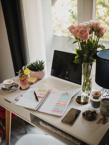 Preview wallpaper table, laptop, notepad, flowers, aesthetics