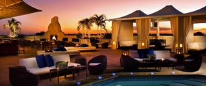 Preview wallpaper tables, palm trees, swimming pool, recreation, candles, evening, fire, furniture, cafes, outdoor furniture