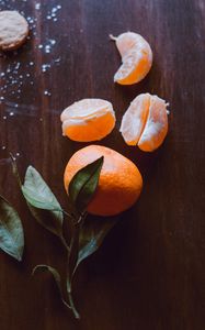 Preview wallpaper tangerine, fruit, slices, leaves, citrus
