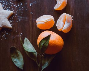 Preview wallpaper tangerine, fruit, slices, leaves, citrus