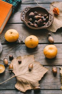 Preview wallpaper tangerines, acorns, leaves, chestnuts, autumn