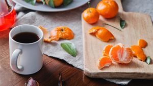 Preview wallpaper tangerines, citrus, fruit, cup, tea