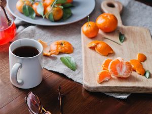 Preview wallpaper tangerines, citrus, fruit, cup, tea