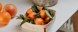 Preview wallpaper tangerines, fruit, citrus, box, flower