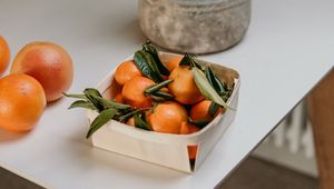 Preview wallpaper tangerines, fruit, citrus, box, flower