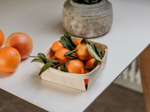 Preview wallpaper tangerines, fruit, citrus, box, flower