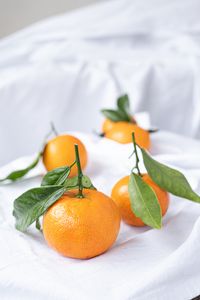 Preview wallpaper tangerines, fruits, citrus, leaves, orange