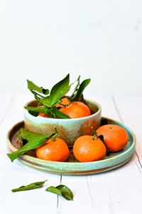 Preview wallpaper tangerines, fruits, citrus, leaves, plates