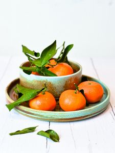 Preview wallpaper tangerines, fruits, citrus, leaves, plates
