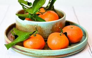 Preview wallpaper tangerines, fruits, citrus, leaves, plates