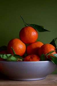 Preview wallpaper tangerines, fruits, leaves, orange