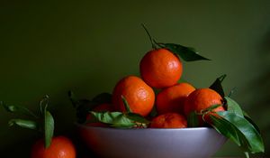 Preview wallpaper tangerines, fruits, leaves, orange