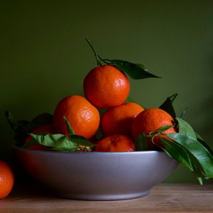 Preview wallpaper tangerines, fruits, leaves, orange