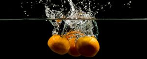 Preview wallpaper tangerines, fruits, water, underwater, spray