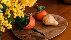 Preview wallpaper tangerines, pear, fruits, mimosa, flowers, bouquet