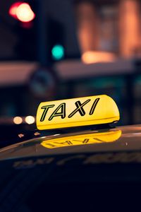 Preview wallpaper taxi, checker, text, inscription, yellow