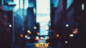 Preview wallpaper taxi, town, inscription