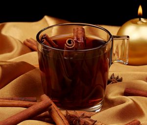 Preview wallpaper tea, cinnamon, cup, glass, candle, cloth, gold